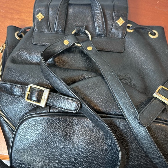 MCM Black Leather Drawstring Shoulder Backpack with Gold Accents - Picture 2 of 11
